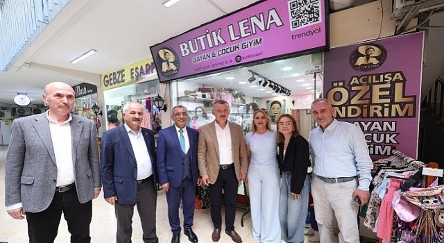 ”Aynı sokağın insanı, aynı şehrin yol arkadaşıyız”