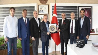 Okan’dan Başkan Topaloğlu’na ziyaret