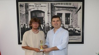 Tayfun Canlı, şampiyon ile buluştu!