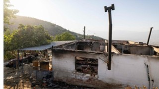 Büyükşehirden evi yanan aileye yardım eli