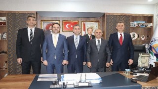 ”Başkanlardan, Kandıra Belediye Başkanı Adnan Turan'a ziyaret” haberi